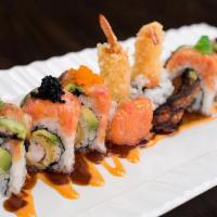 Color Dragon Roll · 8 pcs.
Shrimp tempura inside, topped w. spicy tuna, Eel & avocado w . spicy mayo & eel sauce.