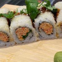 Crunchy Spicy Crabmeat Roll · Spicy crabmeat and cilantro inside, Top with tempura flakes and eel sauce.