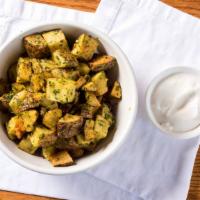 Spicy Potato · Diced potato, deep fried and mixed with our house garlic cilantro sauce.