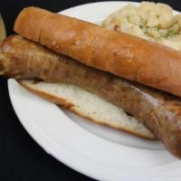 Bratwurst Sandwich · Extra-lean cuts of pork links mildly seasoned, grilled, und served on a toasted New England ...