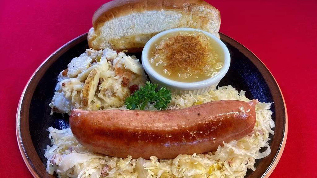 Garlic Knockwurst Platter · The traditional German hickory smoked beef und pork sausage with a hint of garlic stuffed in a natural casing, grilled to perfection. Served over hot kraut und pork with our German Potato Salad, Chunky Applesauce, und split top bun.
