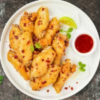 Miss Sweet Chili Wings  · Fresh chicken wings, fried until golden brown, and tossed in sweet chili sauce.