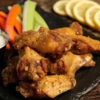 Bone-In Lemon Pepper Wings · 8 piece lemon pepper wings - mild heat. Come with 8  classic style bone-in wings, carrots an...
