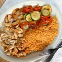 Pollo Loco · Grilled chicken breast. Covered with cheese sauce. Served with rice, tortillas, grilled onio...