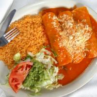 Enchiladas Tapatias · Three chicken enchiladas. Served with rice, guacamole salad and sour cream.