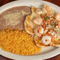 El Potosino · A combination of chicken grilled fillet and grilled shrimps. Topped with pico de gallo and s...