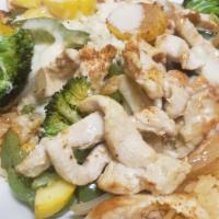 Pollo Loco · Grilled chicken, zucchini, squash, bell peppers, onions, and broccoli on a bed of Mexican ri...