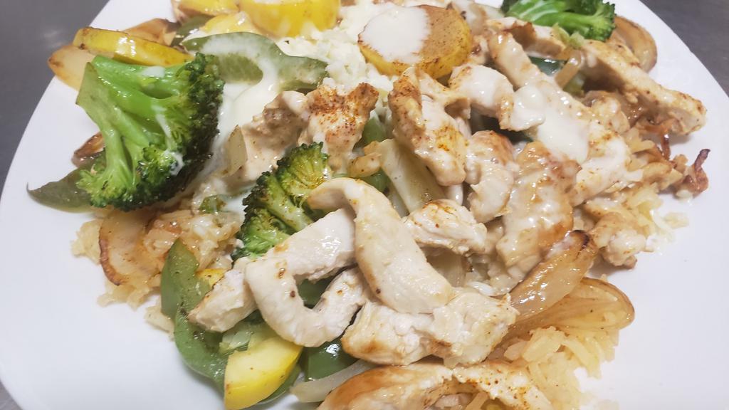 Pollo Loco · Grilled chicken, zucchini, squash, bell peppers, onions, and broccoli on a bed of Mexican rice topped with melted cheese and our special cheese sauce.