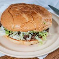 Tortas · Served with lettuce, tomato, avocado, cheese, sour cream, and beans.