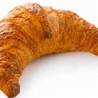 Plain Large Croissant · Large buttery croissant warmed and topped with powder sugar.