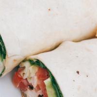 Lemon Tahini Chicken Wrap · Slices of grilled chicken breast with lettuce, tomato, sauteed poblano peppers and onions an...