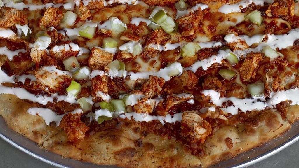 Hot Chicken Pizza. · Spicy pimento cheese, Nashville hot chicken, habanero oil, chopped pickles, ranch