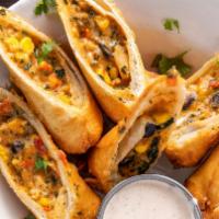 Southwest Egg Rolls · Lightly fried to perfection filled with chicken, black beans, corn and peppers. Served with ...