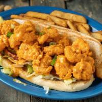 Southwest Shrimp Po’Boy · ½ lb. of our fried shrimp tossed in a spicy Southwest sauce with all the trimmings.