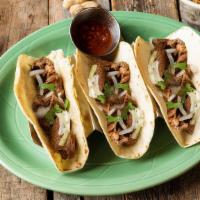 Steak Tacos · 3 Steak Tacos served with fresh cilantro and diced white onions your choice of flour or corn...