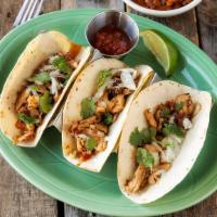 Shredded Chicken Tacos · 3 Shredded Chicken Tacos served with fresh cilantro and diced white onions. Your choice of f...