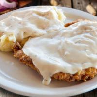 The Duke'S Chicken Fried Steak · Lightly fried and covered with your choice of white or brown gravy.