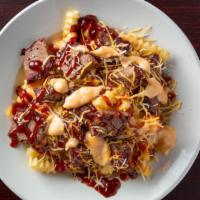Willies Sundae · Fries topped with queso cheese, BBQ sauce and your choice of meat