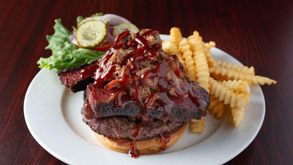 Monster Bbq Burger · ½ Pound Black Angus burger, topped with brisket, pulled pork, pastrami, BBQ sauce, lettuce, tomato, onion, pickle