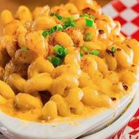 Mimi'S Mac And Cheese · Creamy blend of cheeses made to order with Cavatappi pasta topped off with melted cheddar ch...