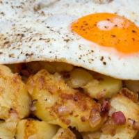 Two Eggs Any Style · Two eggs any style, homemade  hash brown potatoes and a side of  toast, pancakes or English ...