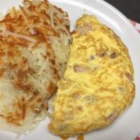 Denver Omelet · Ham of the bone, onions, Green, peppers cheddar cheese. Omelets are made with farm fresh egg...