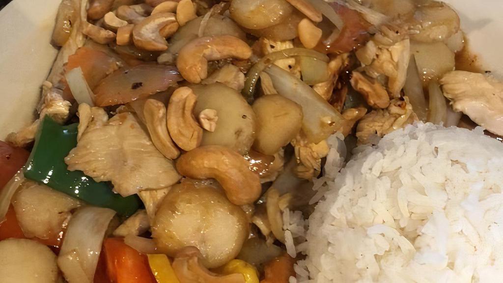 Cashew Chicken · Stir-fried chicken with cashew nuts, water chestnut, onions, and hot peppers in a special homemade sauce. Topped with roasted cashew nut.