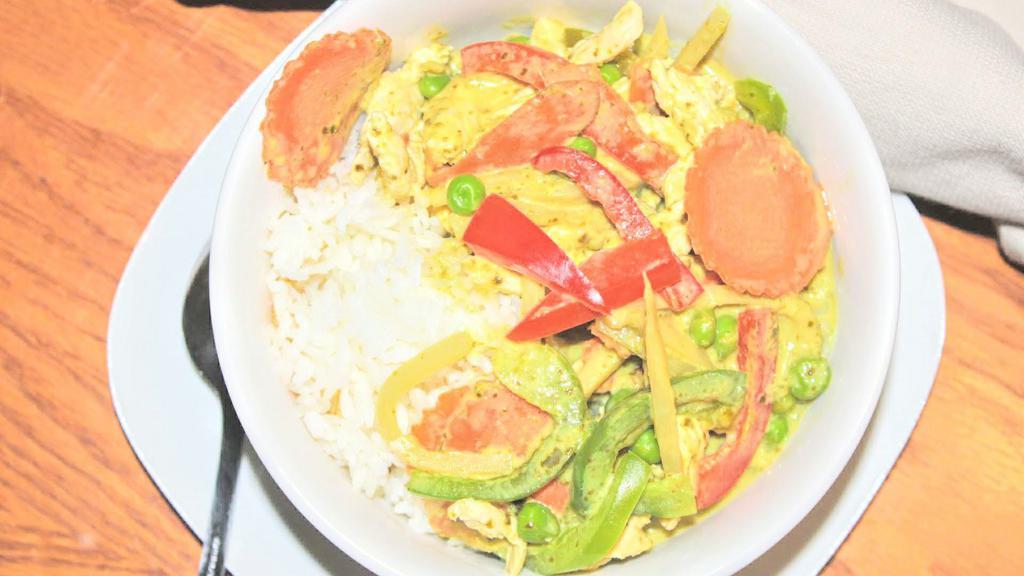 Green Curry · An aromatic green curry with coconut milk ,snow peas, bamboo shoot, bell peppers and fresh sweet basil with your choice of meat.