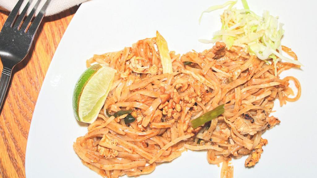 Pad Thai · Stir-fried small flat rice noodles with bean sprouts, green onions, ground peanuts and eggs with choice of meat.