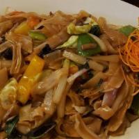 Drunken Noodles · Stir-fried flat rice noodle, your choice of meat with mixed vegetables, chili & fresh sweet ...