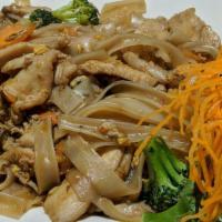 Pad See-Ew · Stir-fried flat rice noodles with egg in brown sweet sauce with broccoli, carrot and your ch...