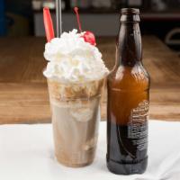 Root Beer Floats · Hank's brand root beer with two scoops of vanilla ice cream topped with whipped cream and a ...