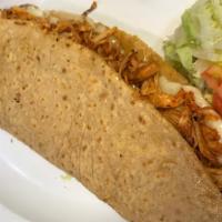 Chicken · GIANT handmade quesadilla filled with delicious hand shredded chicken seasoned in tomato sau...