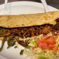 Pastor · GIANT handmade quesadilla filled with our delicious pork meat and chihuahua cheese served wi...