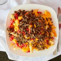 Vista Fries · Deliciously seasoned fries, topped with Flaming Hot Cheetos, Nacho cheese and hand cut steak...