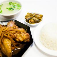 Everest Ginger Chicken · Simmered chicken thighs, wings and fresh sliced ginger. Served with steamed rice, chicken an...