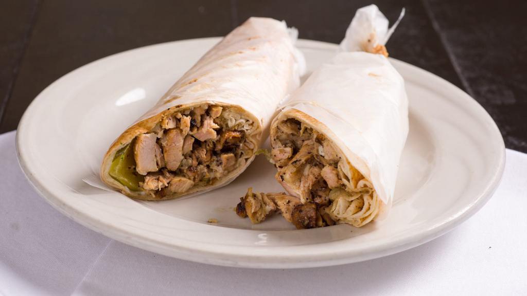 Chicken Shawarma   · Tender strips of marinated chicken served with our house garlic sauce.