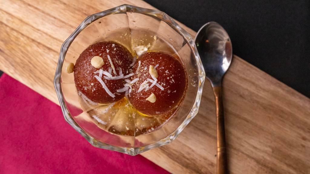 Gulab Jamun
 · Cinnamon flavored pastry sponge, soaked in honey and rosewater.