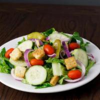 Italian Table Salad · Romaine lettuce, grape tomatoes, red onion, cucumber, pepperoncini and croutons. Your choice...