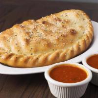Cheese Calzone · Mozzarella cheese wrapped with butter-brushed dough, sprinkled with parmesan and oregano, th...