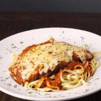 Chicken Parmigiana · Fettuccine noodles, breaded chicken, mozzarella and marinara sauce. Served with garlic bread...