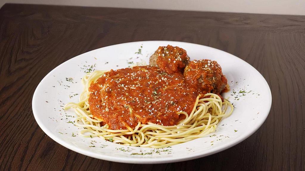 Spaghetti And Meatballs · Spaghetti, marinara sauce, parsley and homemade meatballs. Served with garlic bread and grated cheese.