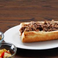 Italian Beef Sandwich · Italian beef with au jus on French bread.