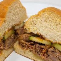 Pulled Pork · House-Smoked Pulled Pork + Homemade Coleslaw + Dill Pickle + Sweet BBQ Sauce