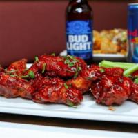 Boneless Wings · 12 home made beer batter wings tossed in your choice of sauce buffalo, honey bbq , bbq, hone...