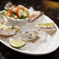 1/2 Docena Oysters Ostiones · 1/2 dozen oysters.