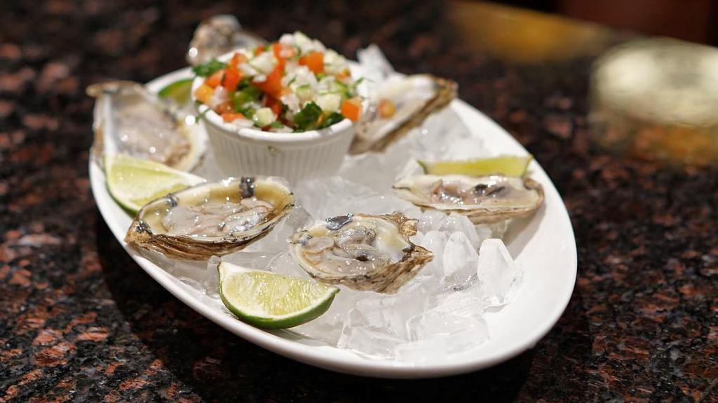 1/2 Docena Oysters Ostiones · 1/2 dozen oysters.