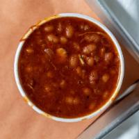 Smoked Baked Beans · A variety of beans jazzed up with our in house ingredients, then loaded with onions, brisket...