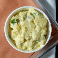 Dill Pickle Potato Salad · Mayonnaise based potato salad with a homemade dressing, loaded with chopped dill pickles, ce...