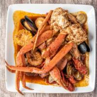 Seafood Platter · Composed of whole shrimp, crawfish, mussels, clams, snow crab, corn and potatoes.